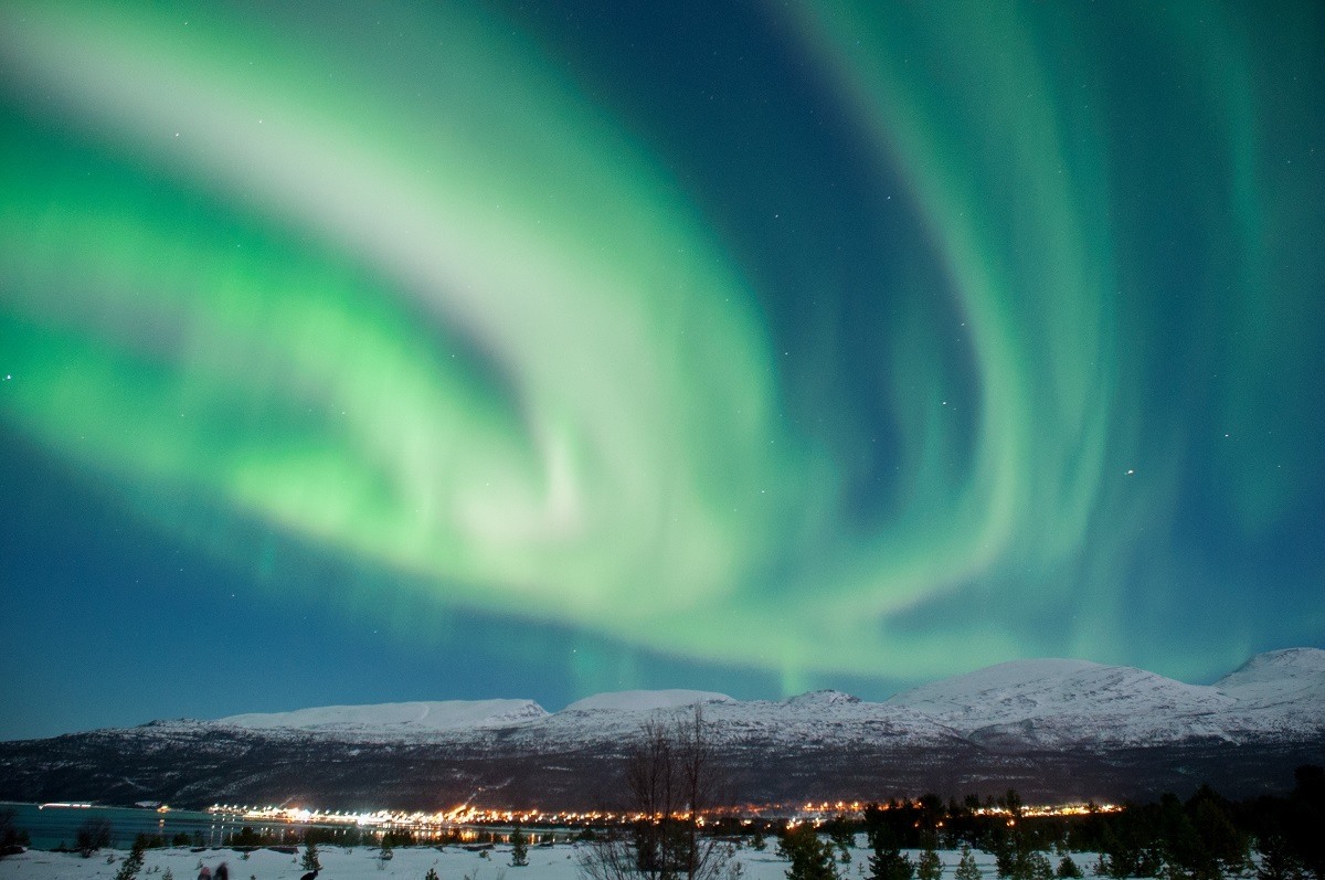 Green Northern Lights display Norway in the winter