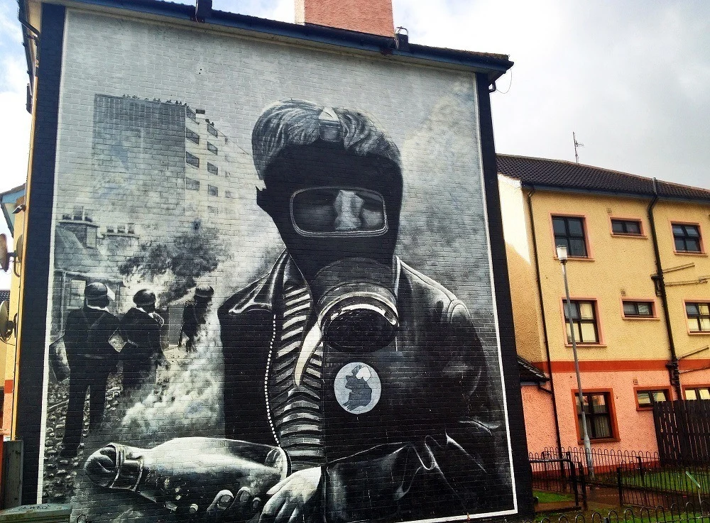 Mural showing man wearing gas mask